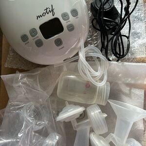 Motif Breast Pump Set. Used only twice . Like new